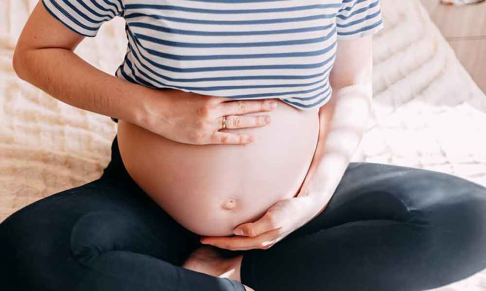 Tricks for getting your baby to move in womb